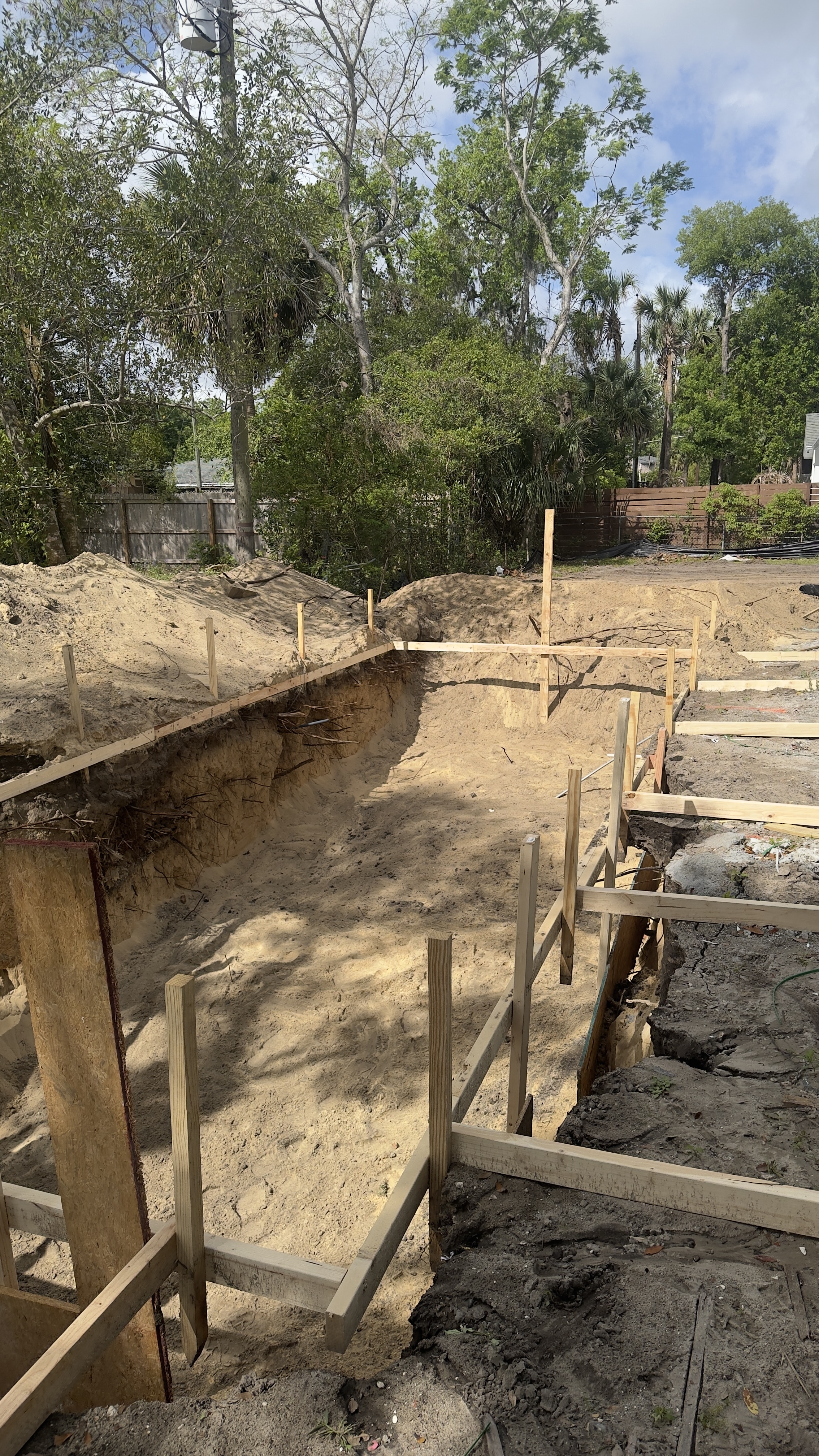Excavation trench with wood forming for pool construction