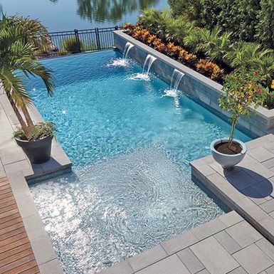 Infinity edge pool with multi-jet waterfall wall